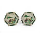 A Pair of Chinese Sancai Porcelain Hexagonal Dishes, Kangxi, each painted with four horses in a