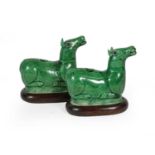 A Pair of Chinese Green Glazed Porcelain Water Droppers, Kangxi, modelled as recumbent deer, 9cm