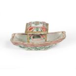 A Chinese Porcelain Model of a Boat, Kangxi, of shaped rectangular form with central cabin,