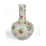 A Chinese Porcelain Bottle Vase, 19th century, of globular form with cylindrical neck, painted in