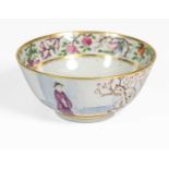 A Chinese Porcelain Bowl, early 19th century, painted in famille rose enamels and gilt with an