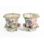 A Pair of Cantonese Porcelain Cache Pots and Stands, early 19th century, of flared hexagonal form,