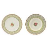 A Nantgarw Dinner Plate and Soup Plate, circa 1820, each painted with a flower sprig within a border