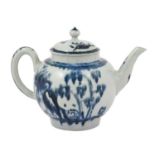 A William Reid Porcelain Teapot and Cover, circa 1758, painted in underglaze blue with the Fir