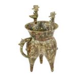 A Chinese Bronze Vessel, in Archaistic style, the flared neck with bird handles, on tripod base with