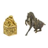 A Chinese Bronze Seal, in Qianlong style, cast with mythical beasts and Taotie, set with semi-