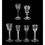 A Wine Glass, mid 18th century, the hammered ogee bowl on an opaque twist stem, 15cm high; A