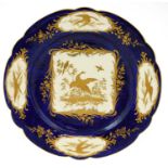 A Vincennes-Style Porcelain Plate, in 18th century style, gilt with exotic birds in landscape on