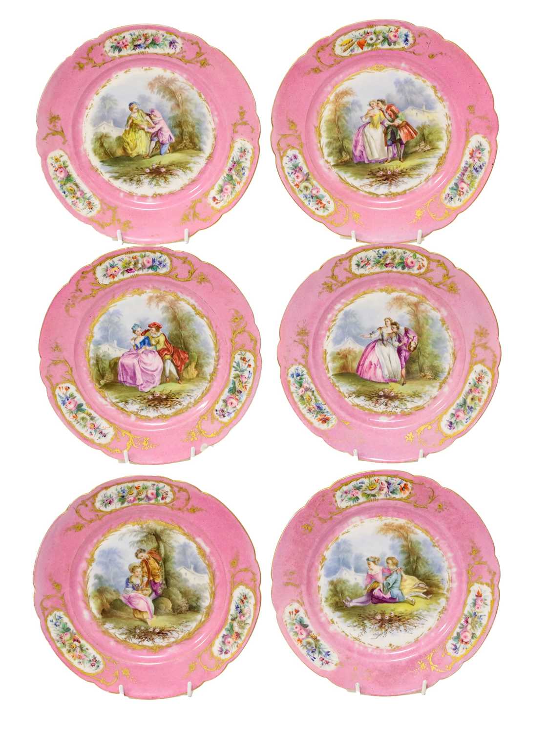 A Sevres-Style Porcelain Dessert Service, late 19th century, painted with Watteauesque figures in