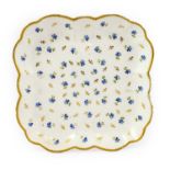 A Nantgarw Porcelain Square Dish, circa 1820, painted and gilt with scattered sprigs within a gilt