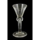 A Wine Glass, circa 1750, the conical bowl on ball knop with air tear extending into plain stem on