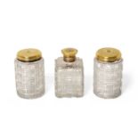 A Set of Three Victorian Silver-Gilt Mounted Cut-Glass Dressing-Table Jars Maker's Mark TD, London,