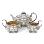 A Three-Piece George IV and William IV Silver Tea-Service The Teapot by Charles Fox, London, 1825, T