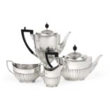 A Four-Piece Victorian Silver Tea and Coffee-Service by William Hutton and Sons, London, 1896