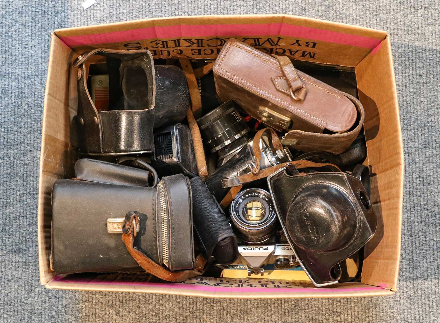 Various cameras including Yashica Minister D, Fujica ST705, Zenit E and others, a few loose lenses