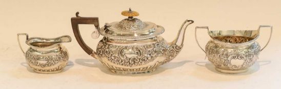 A George V Silver Teapot and Cream-Jug with an Associated Victorian Silver Sugar-Bowl, the teapot