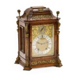 A Burr Walnut Quarter Striking Table Clock, circa 1890, caddied pediment, side sound fret panels,