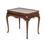 A George III Mahogany and Oak-Lined Silver Table, circa 1760, the moulded top with re-entrant