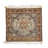 Chinese Silk Rug of unusual size, modernThe ivory field centred by a flowerhead medallion framed