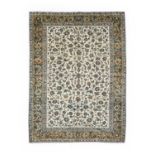 Kashan CarpetCentral Iran, circa 1970The ivory ground with an allover design of scrolling floral