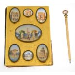 A French Gilt Metal Mounted Aide Memoire, 19th century, set with seven miniature watercolours on