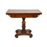 A George IV Mahogany Foldover Tea Table, 2nd quarter 19th century, with pivoting reeded edge above a