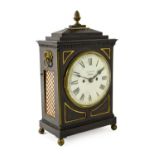 An Ebonised Striking Table Clock, signed Mortimer, Strand, circa 1820, stepped pediment, fish