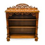 A Victorian Figured Walnut Dwarf Bookcase, circa 1870, the moulded top with foliate C scroll gallery