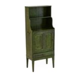 A Regency Free-Standing Bookcase Cupboard, early 19th century, repainted green above a single