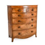 ^ An Early 19th Century Mahogany and Pine-Lined Bowfront Chest of Drawers, of two short over four