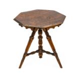 A Victorian Oak and Pine-Top Octagonal Shaped Gypsy Table, late 19th century, with scrolled