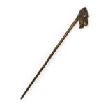 A Carved and Lacquered Wood Walking Stick, possibly German, late 19th century, the handle carved