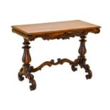 An Early Victorian Rosewood Writing Table, circa 1850, the moulded top above an acanthus scrolled