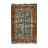 Unusual RugTurkish or Indian, circa 1950The forest green field with a oneway design of trees