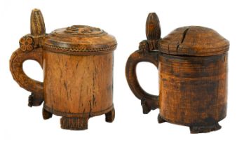 A Norwegian Birch Tankard, 18th century, of cylindrical form, the hinged domed cover carved with a