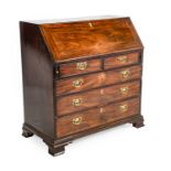 ^ A George III Mahogany and Oak-Lined Bureau, circa 1780, the fall front enclosing a good fitted