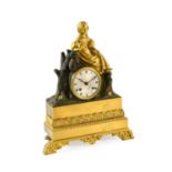 A Gilt Metal Striking Mantel Clock, circa 1840, surmounted by a lady holding a bird and a cat at her