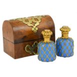 A Pair of French Gilt Metal Mounted Blue Glass Scent Bottles, circa 1860, of shouldered