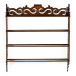 A Set of Victorian Mahogany Wall Shelves, late 19th century, the four fixed shelves with foliate and