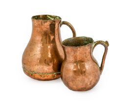 A Flemish Copper Ewer, 16th century, of pear form with loop handle, 19.5cm high; and A Similar
