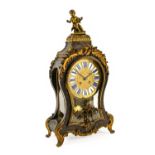 A French "Boulle" Striking Table Clock, retailed by Meyer A Paris, circa 1850, surmounted by a