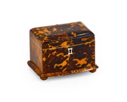A Regency White Metal and Ivory Mounted Tortoiseshell Tea Caddy, of domed bowfront rectangular form,