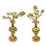 A Pair of Gilt Metal Four-Light Candelabra, in Louis XV style, as flowers issuing from wrythen