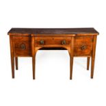 ^ A Regency Mahogany, Boxwood and Ebony Strung Breakfront Sideboard, early 19th century, with long