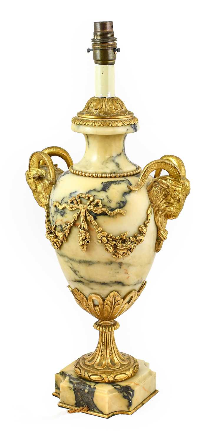 A Gilt Metal Mounted Veined Yellow Marble Lamp Base, in Louis XVI style, of baluster form, the ram's