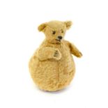 Rare Early 20th Century Steiff 'Roly Poly' Bear in yellow mohair with jointed head, boot black eyes,