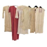 Early 20th Century Day Dresses, comprising a white cotton muslin example with three quarter sleeves,