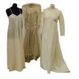 Early 20th Century Sleeveless Wedding Dress in cream net with scooped neckline and back, faux top to