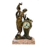 A spelter and marble figural mantle clock striking on a bell, 48cm high