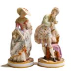 A large pair of French porcelain figures of a lady and gentleman, late 19th century, in formal